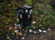 Rubbish bin over flowing on a public footpath